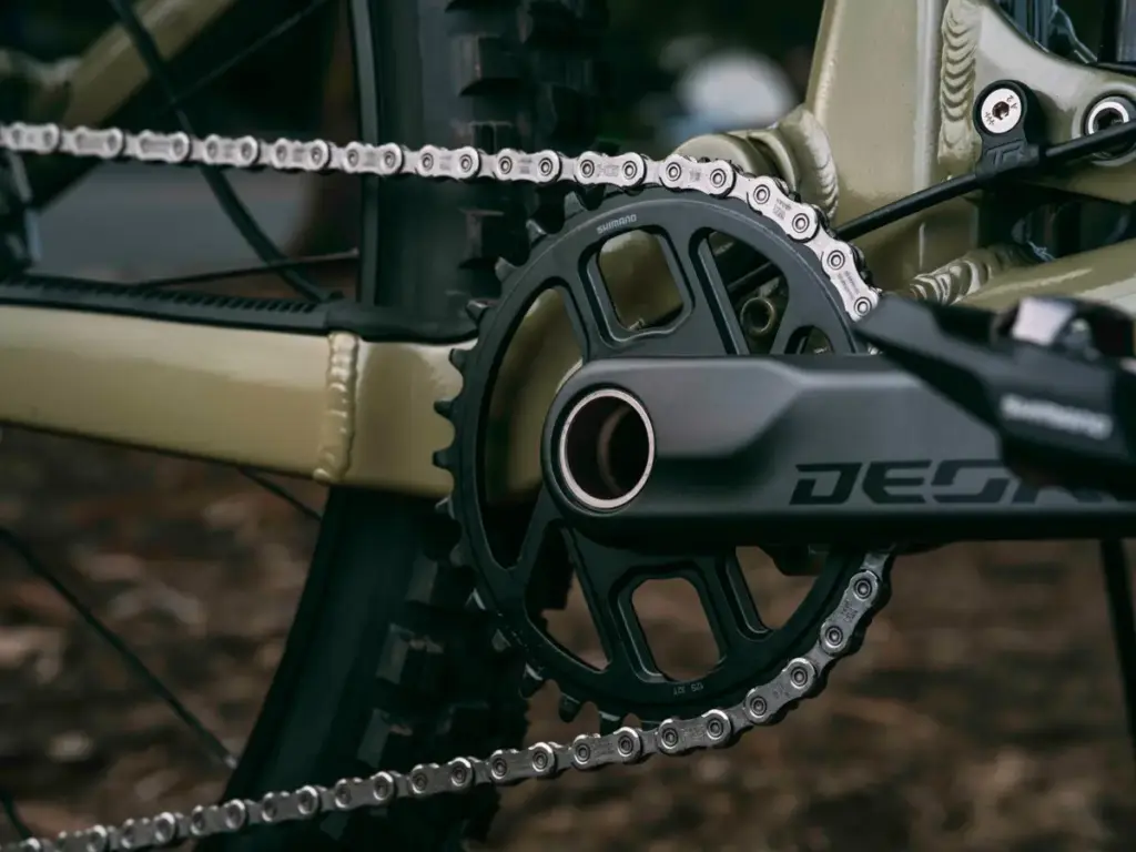 Shimano DEORE crankset and chainring fitted to a mountain bike