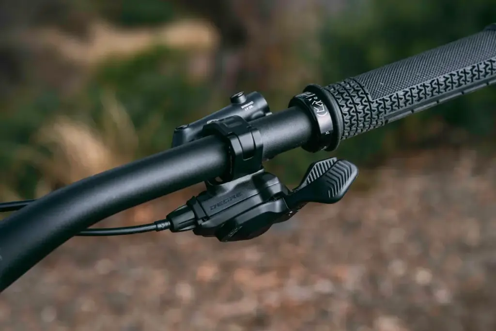 Shimano DEORE shifter mounted on a handlebar