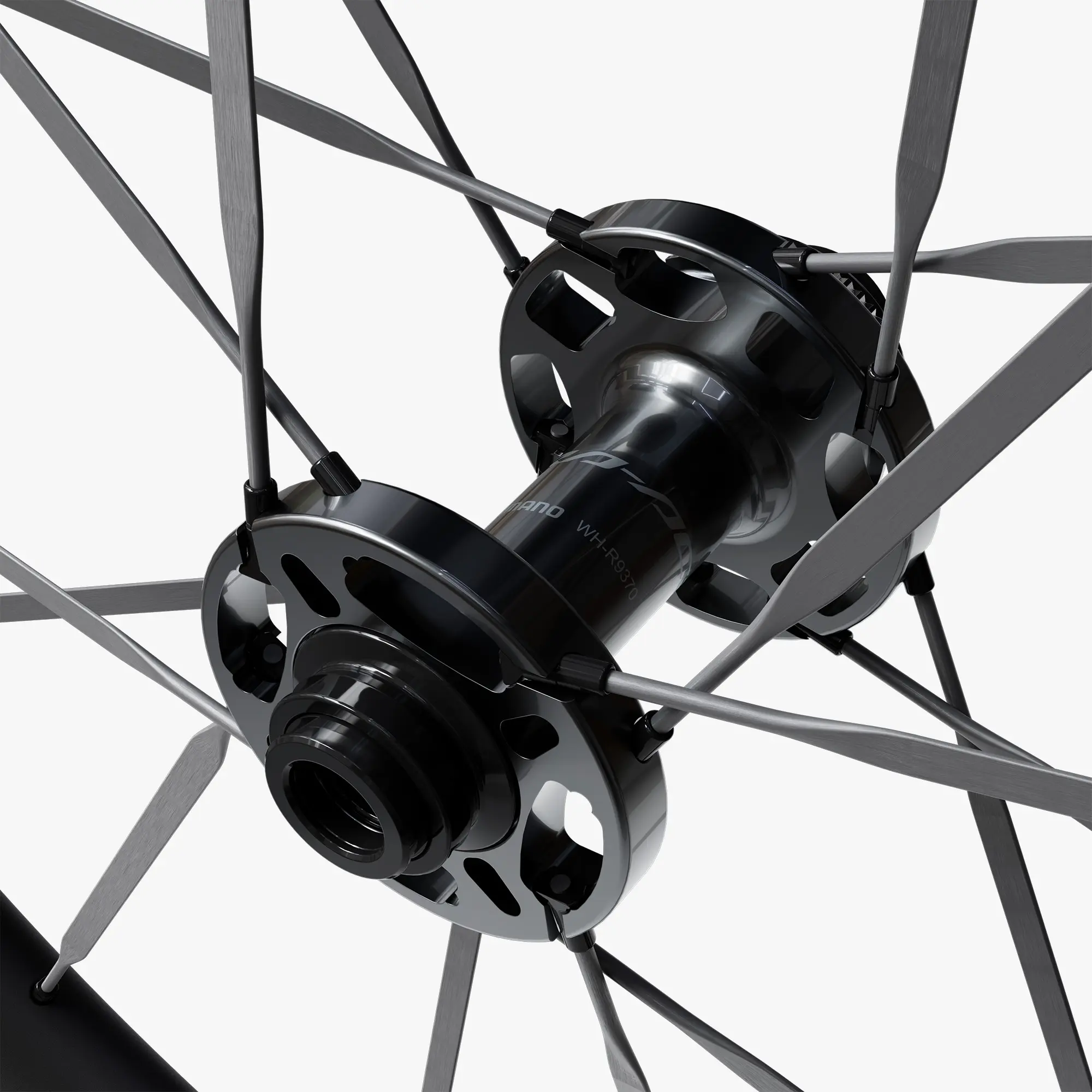 Détail du moyeu WH-R9370 à roulements cuvette-cône et des rayons carbone Aero