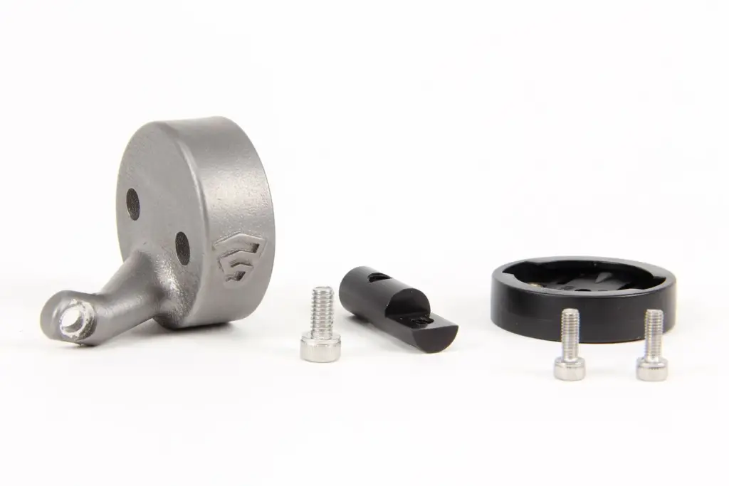 Firefly bolts the rear radar to the seat collar, in 3D-printed titanium