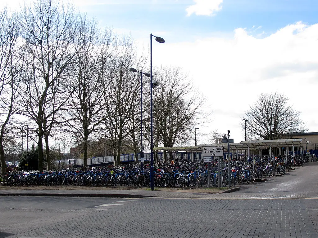 Bikes parked outside a British railway station, where reported bike thefts are falling