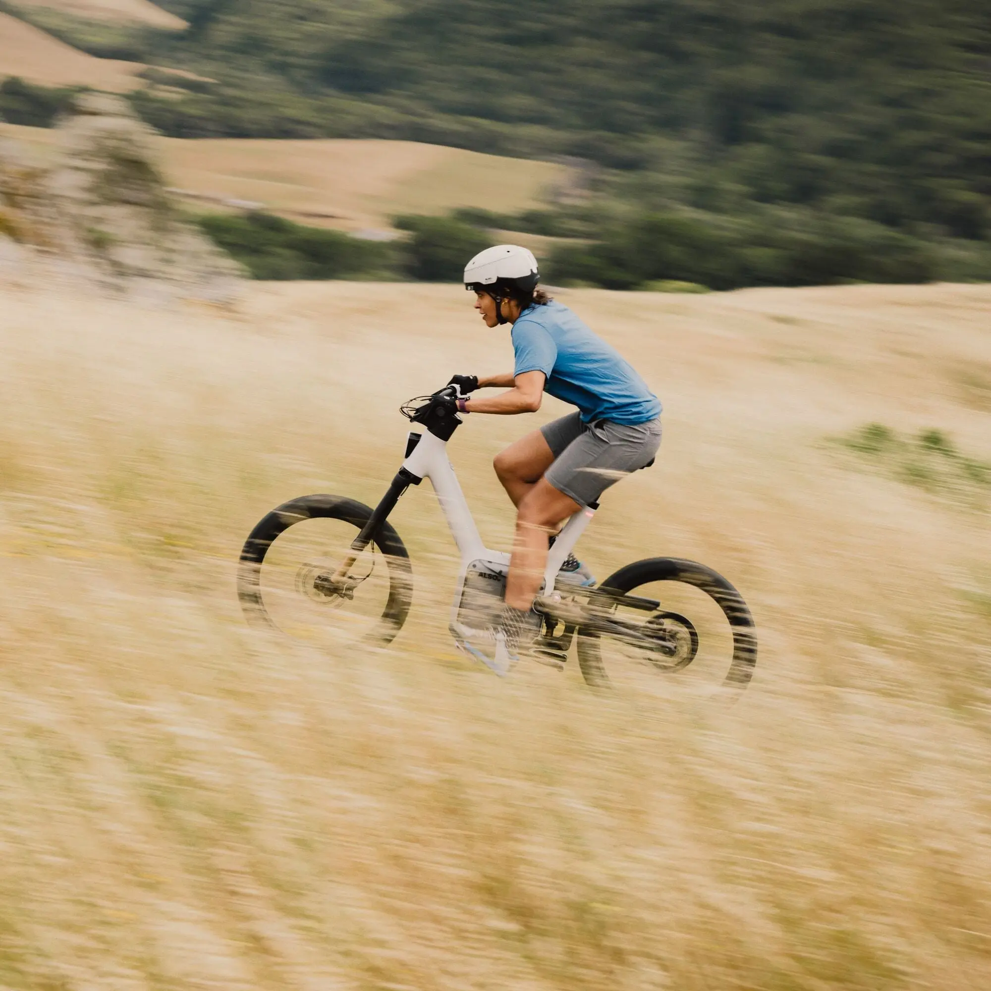 ALSO TM-B electric bike riding through a field