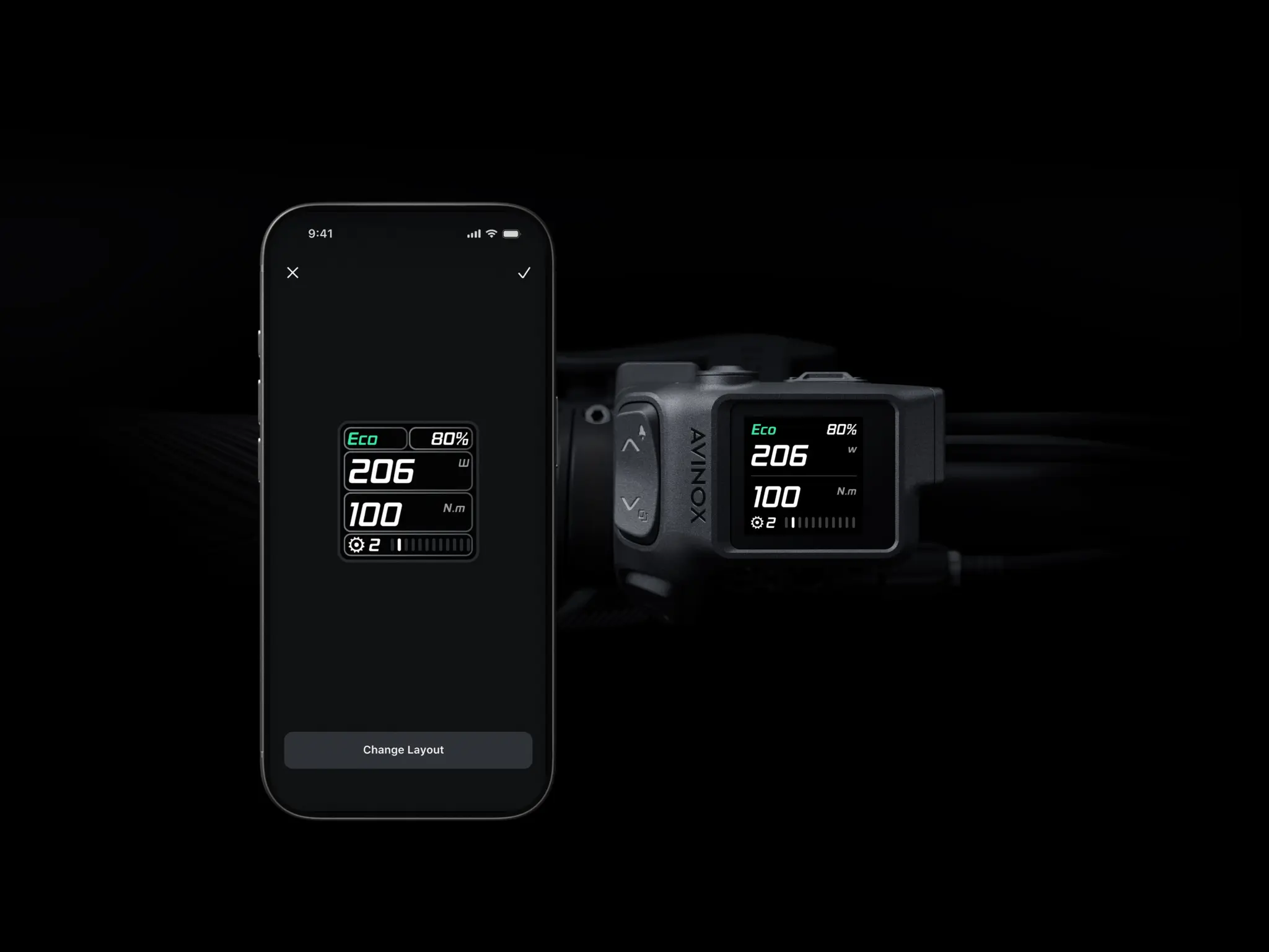 Écran Avinox DP200 sur le cintre à côté d'un smartphone affichant l'application de personnalisation