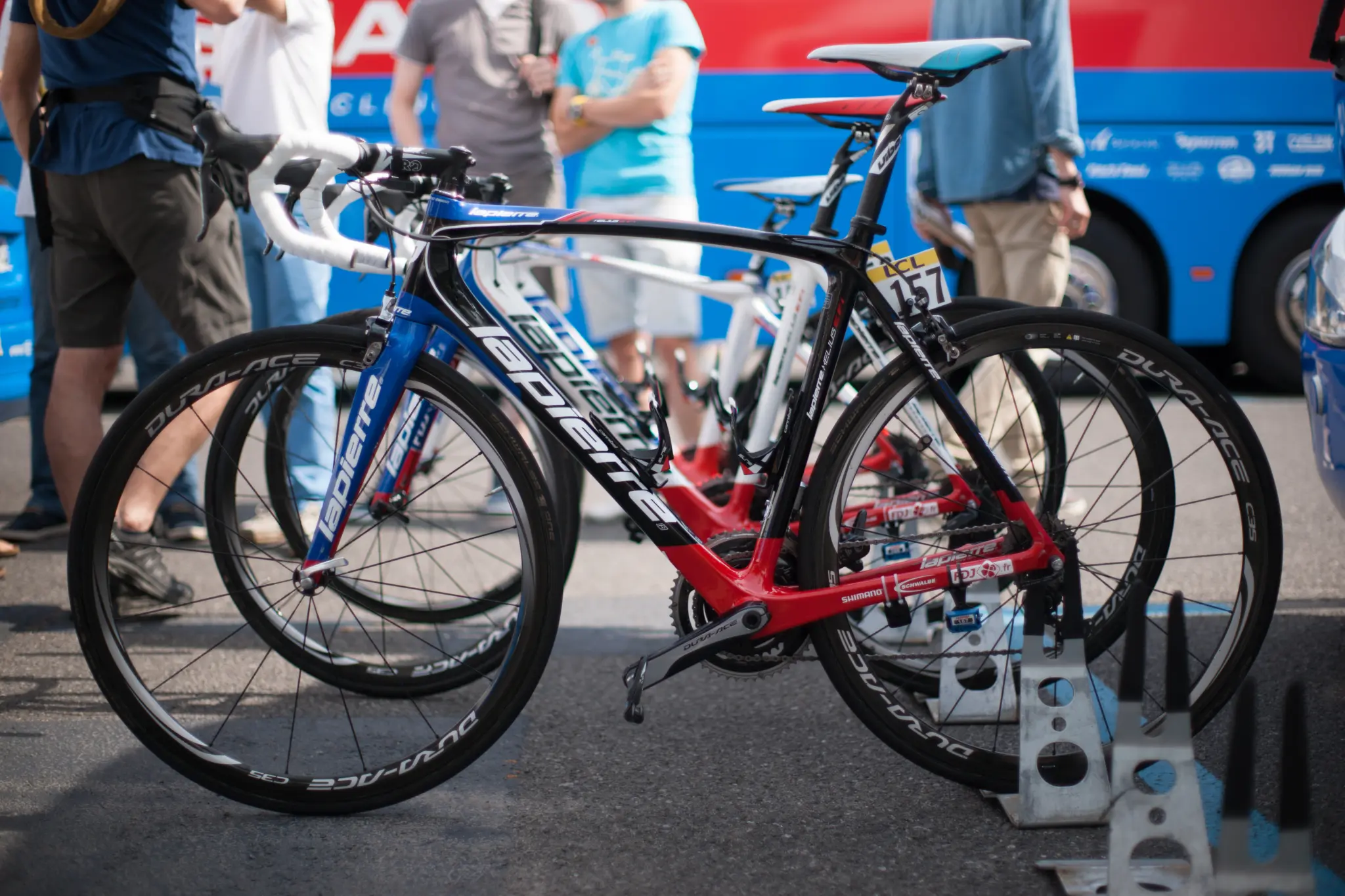 Cycles Lapierre road bikes of the FDJ team lined up at a race