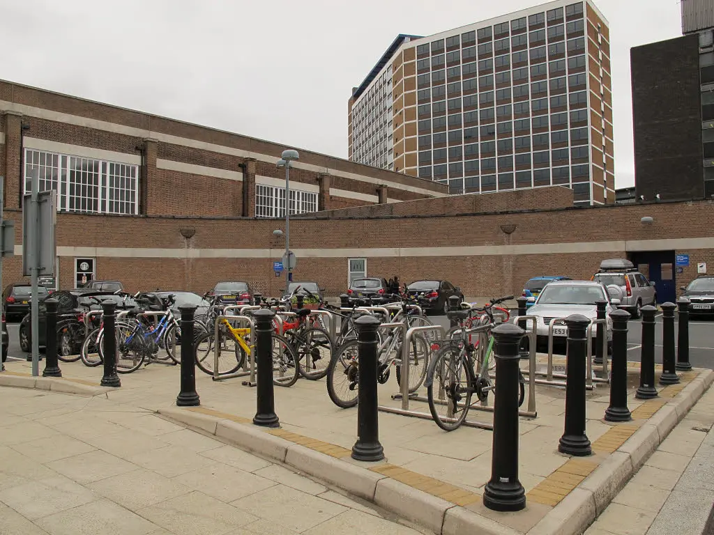Full bike racks outside Leeds station, operated by Network Rail