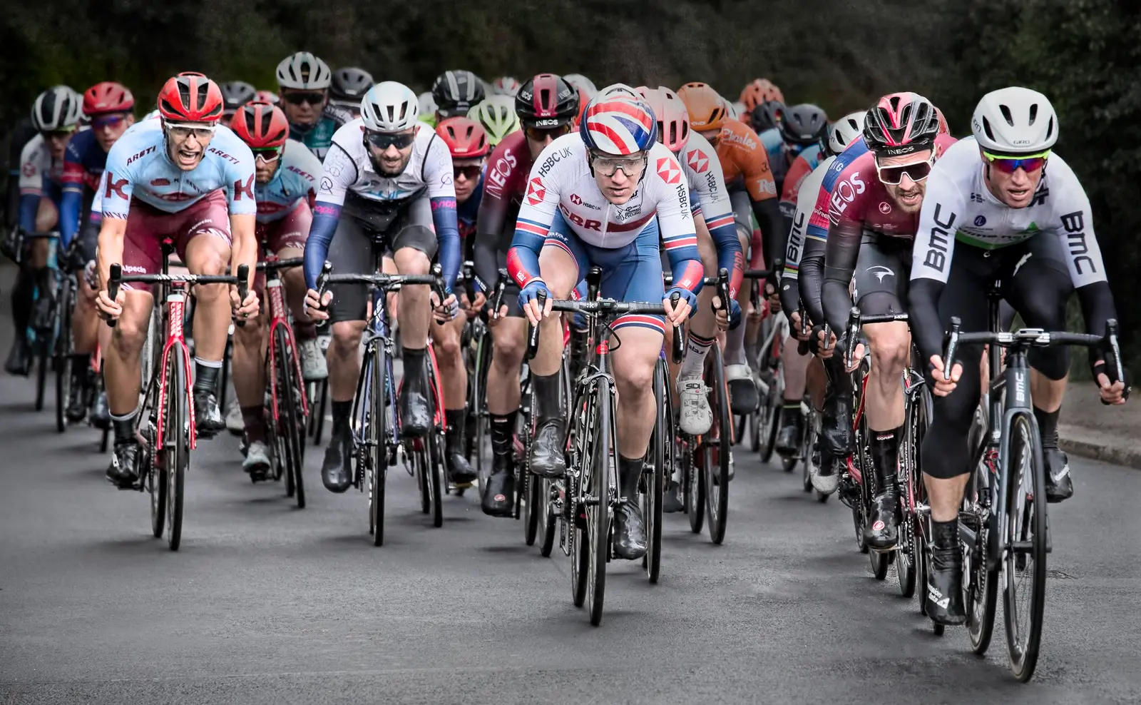 Final sprint alongside the barriers, illustrating the UCI's safety measures