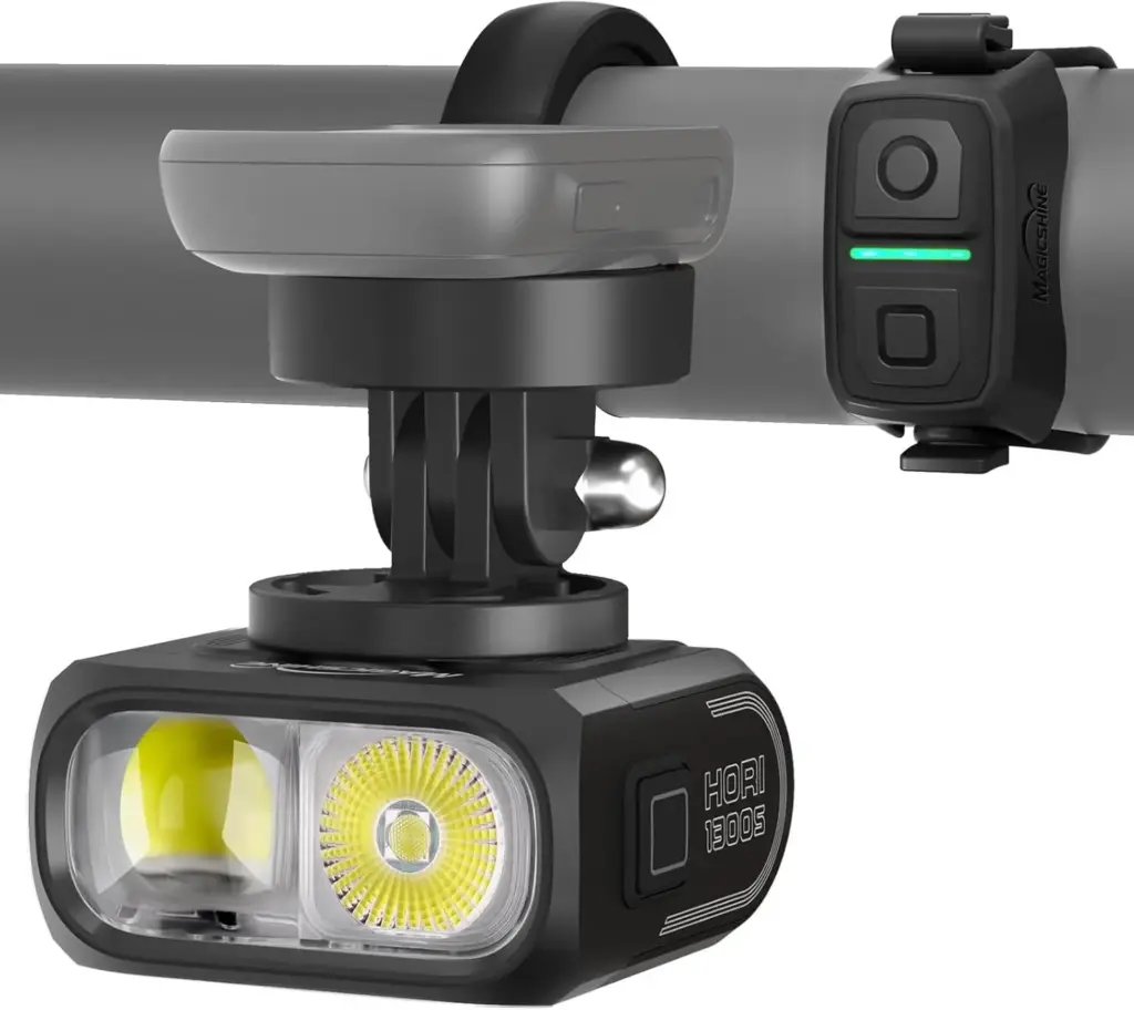 Magicshine Hori 1300S bike light under a bike computer mount, with its remote