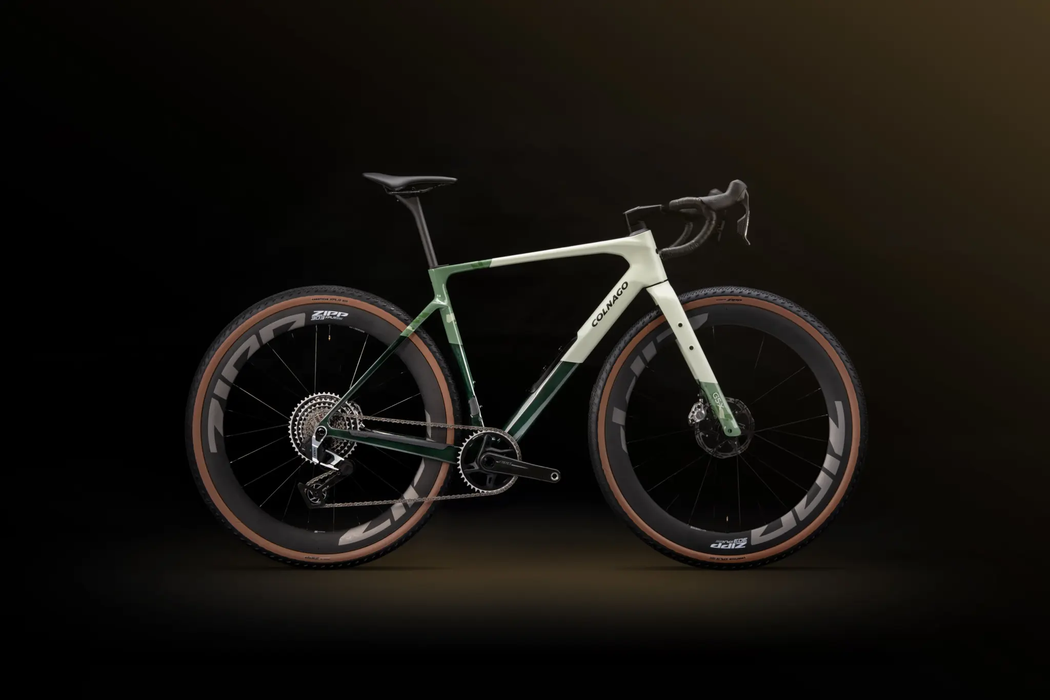 The Colnago G5-X in pale green and dark green, side view on a black background
