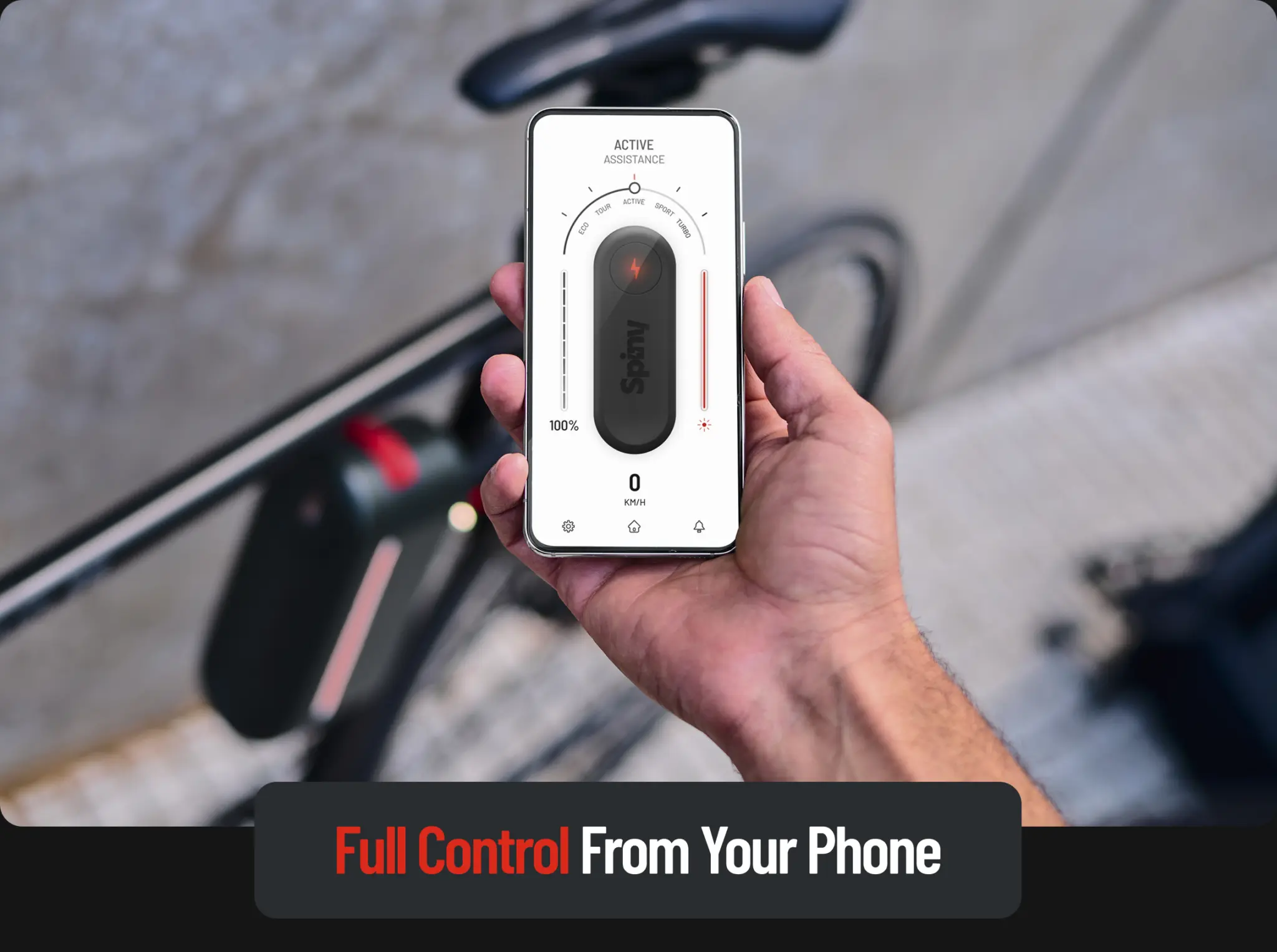 Main tenant un smartphone affichant l'application du Spiny 2, le boîtier monté sur le vélo en arrière-plan
